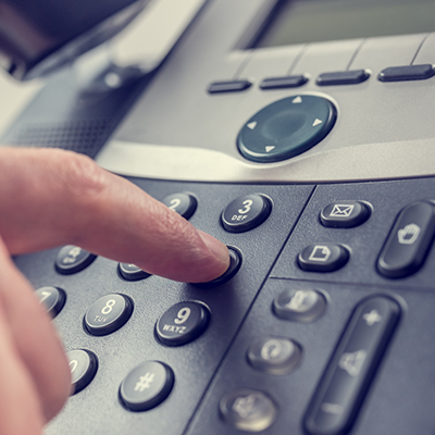 A person dialing in to get a personal loan on SC credit card
